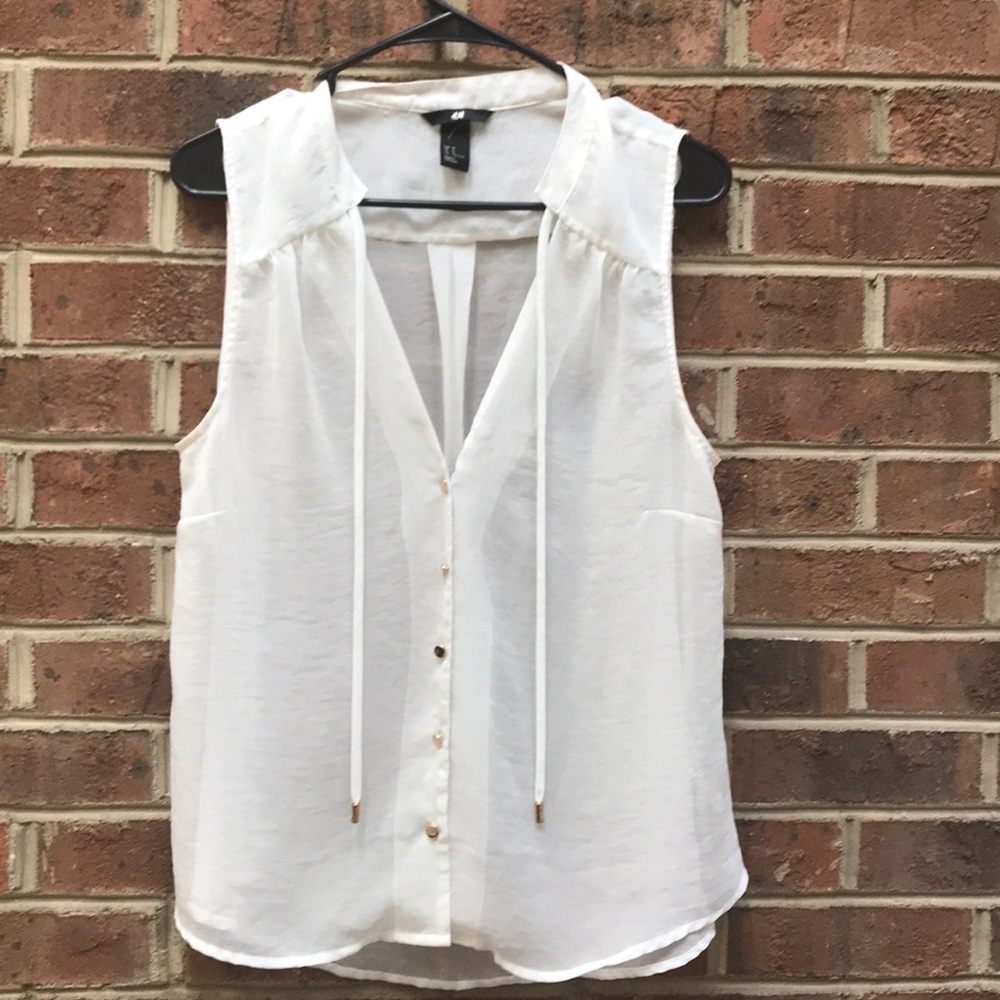Sheet white blouse with gold buttons